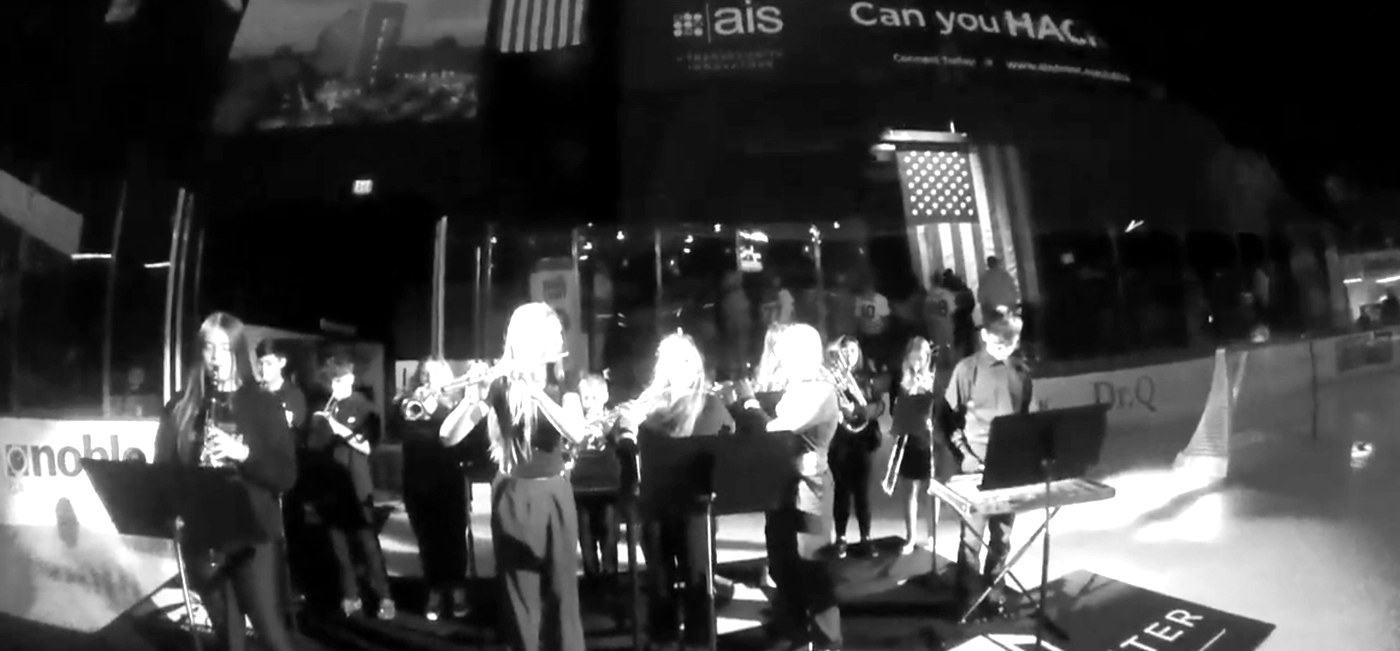 PCS band performing the National Anthem at a Utica Comets game