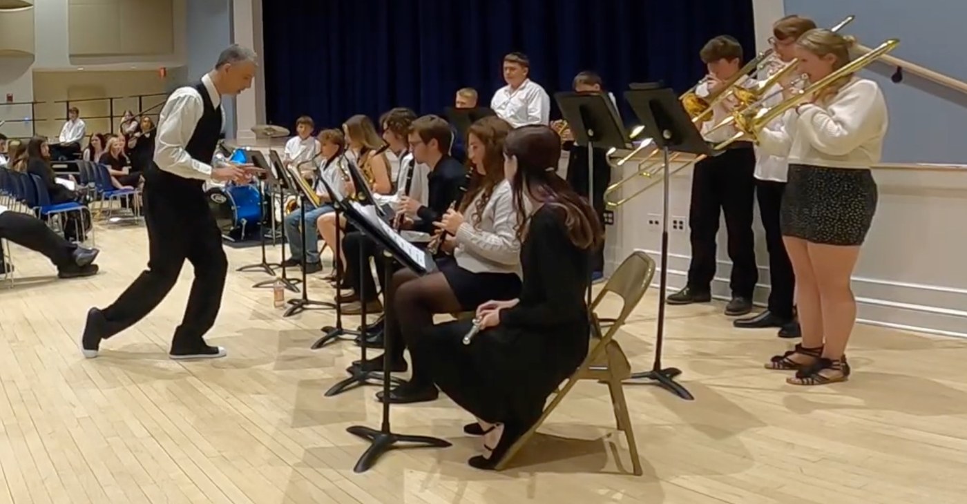Mr. Brown conducting Jazz Band in performance