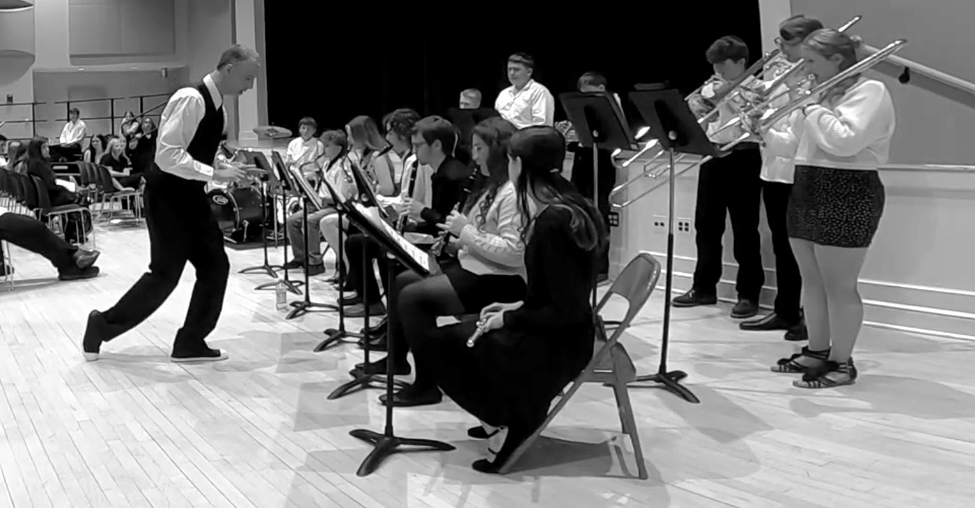 Mr. Brown conducting Jazz Band in performance